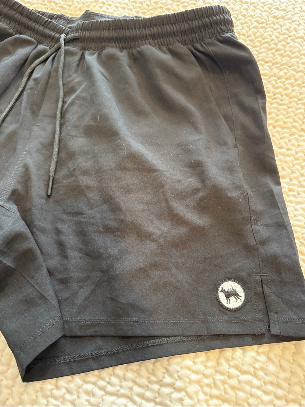 Men's Black Athletic Shorts with Subtle Wolf Patch